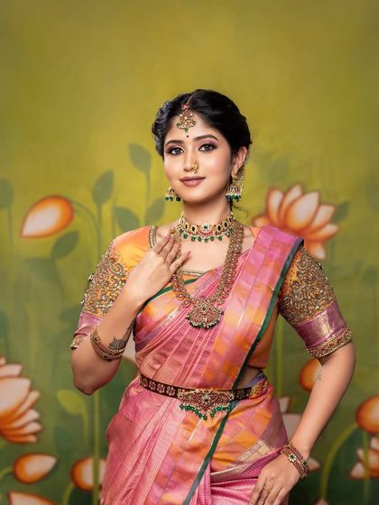 A classic portrait from a portfolio shoot. The makeup is flawless, the jewellery is stunning, and the overall look is the epitome of South Indian bridal elegance.