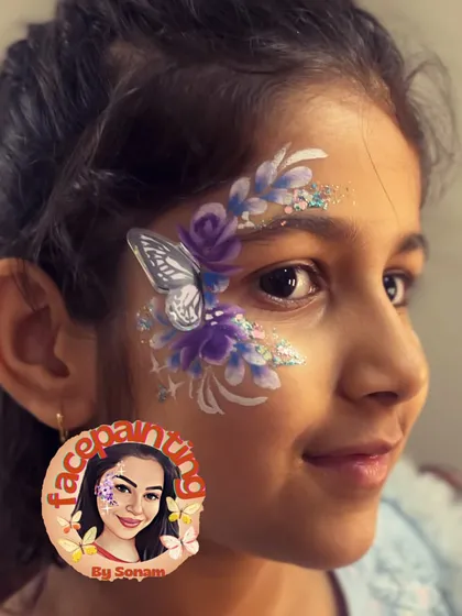 I used shades of purple and silver glitter for this elegant butterfly look. The cool tones give it a dreamy, magical feel.