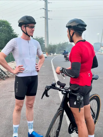 A candid conversation between two members during a break.