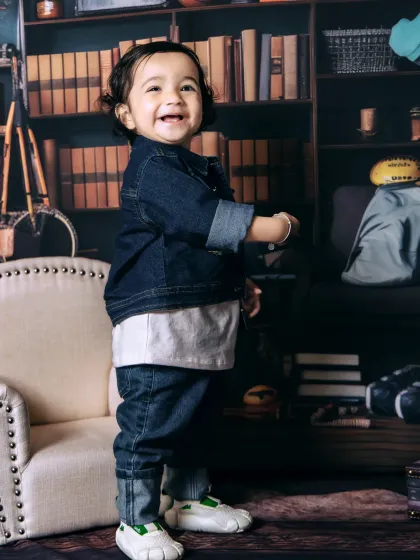A big, happy smile from a growing boy. We capture portraits at every stage of childhood.