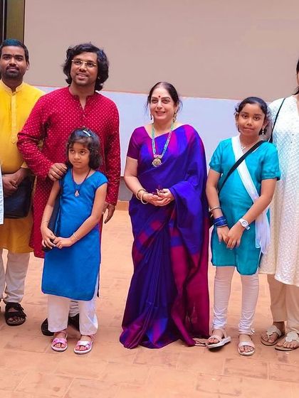 Another happy group photo with the founder, Sangeetha Srikishen Ma'am, and the flute performers.