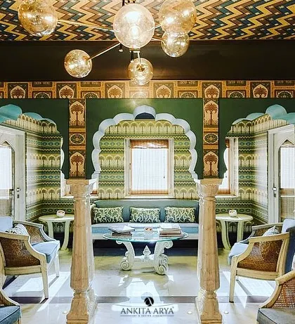 For the Surya Haveli in Jaipur, I designed a series of wallpapers that echo the city's royal heritage. This space features custom arches and patterns inspired by traditional Rajasthani architecture, creating an immersive, palatial experience.