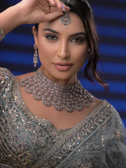 A different angle of the jewelry shoot look, showing how the maang tikka is perfectly placed and the makeup complements the cool tones of the diamonds.