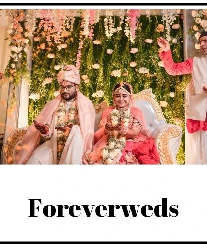 The 'Vivahhh'. A sacred moment from Himanshu and Nidhi's wedding ceremony, as they sit in the mandap, surrounded by beautiful floral decor.