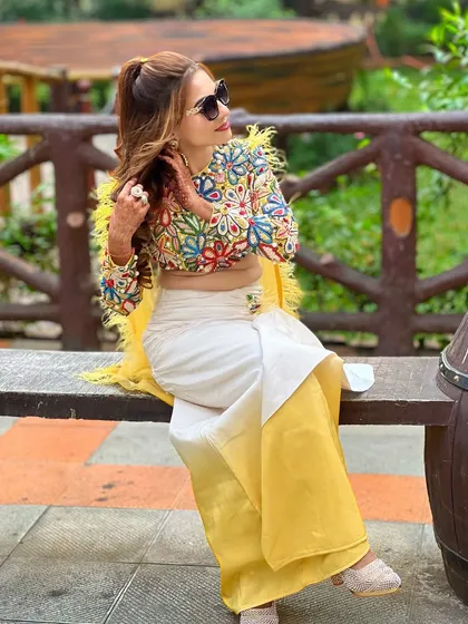 A candid shot of the client enjoying the party, looking effortlessly chic.