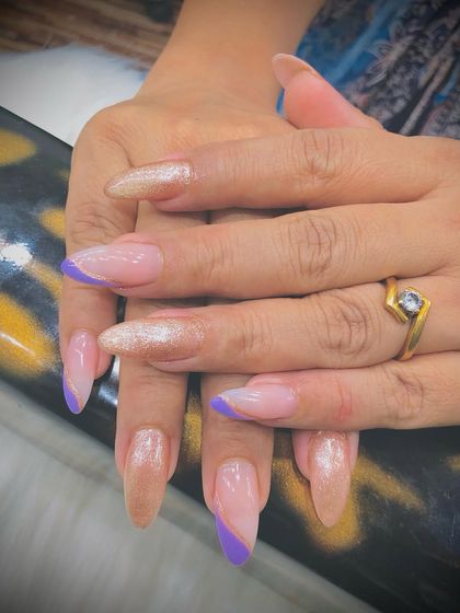 Another view of the golden and lavender set, showing the almond shape.