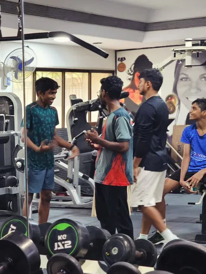 A moment of team bonding in the gym. A positive and supportive environment is key to our academy's success.