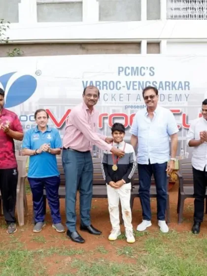 A young player receiving his award for outstanding performance in the U-12 Varroc Cup.