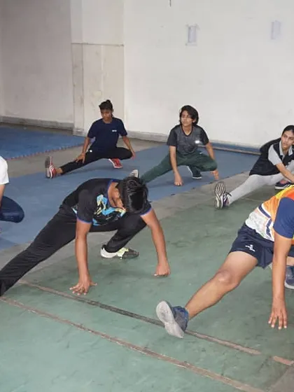 Fencers perform deep stretches to improve flexibility in their legs and hips. This is vital for executing the explosive lunges and quick direction changes required in fencing.