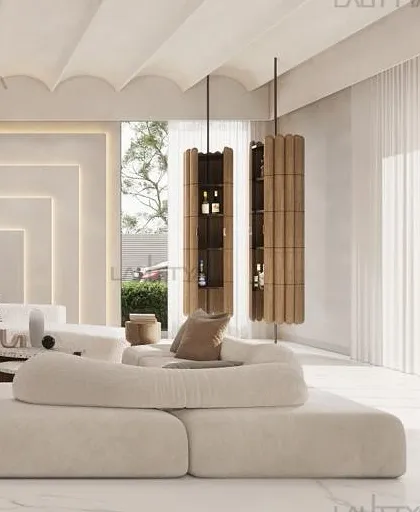A unique view of the living area, highlighting the suspended, fluted bar cabinets that act as both storage and sculpture. The soft, modular sofa and backlit wall panels add to the contemporary, luxurious feel.