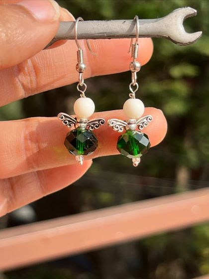 Another colour variation of the angel earrings, this time with a darker green crystal bead. I have many colours available for you to choose from.