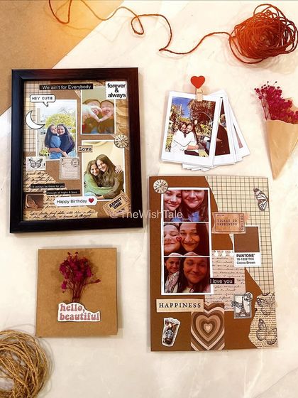 A full set of handmade gifts. This collection includes a scrapbook frame, a matching card, a stack of polaroid prints, and a small card with dried flowers.
