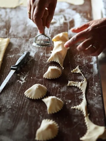 There's something so satisfying about making your own stuffed pasta. Here, I'm showing how to use a classic pasta cutter to create perfect, pillowy ravioli from fresh dough.