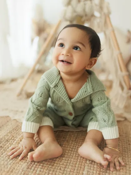 Starry eyes and the sweetest smile. This little boy's first birthday session had a gentle, rustic camp theme, perfect for a little explorer.