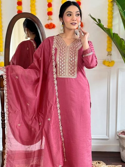 This dusty pink viscose chanderi kurta is soft and romantic. The heavy thread and sequin work give it a dressy feel without being over the top.
