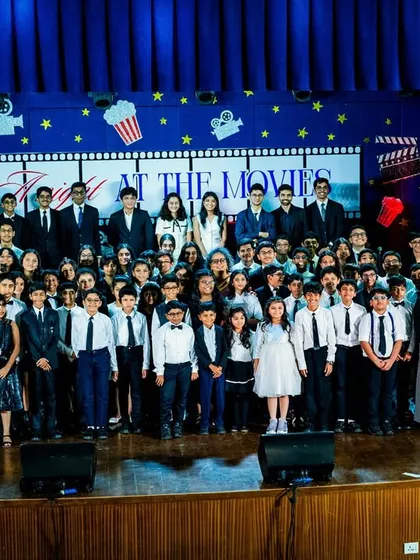 The Euphony family photo from our 2025 concert. This picture captures the incredible community of students, teachers, and parents who make these nights possible.