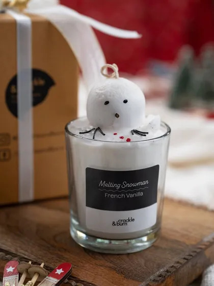 Another look at my adorable Melting Snowman candle, showing the details of his little face and arms.