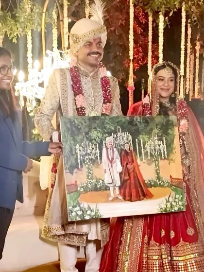 Presenting the completed canvas to the happy couple is always a highlight. Here you can see the scale of the 30x36 inch gallery canvas and the joy of having a unique piece of art from your wedding day.