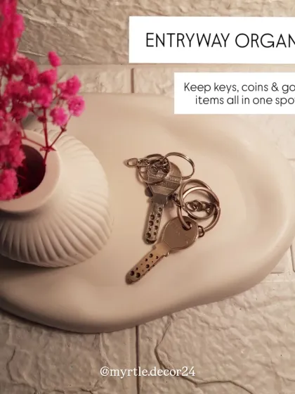 The cloud tray used as an entryway organizer. It’s the perfect spot to drop your keys and a small vase of flowers for a welcoming touch.