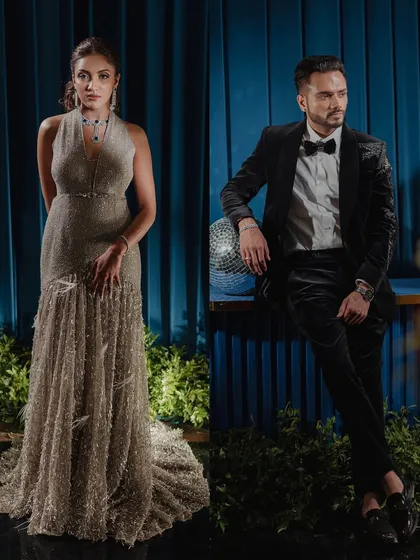 A diptych of individual portraits against a rich blue backdrop. We pose the bride and groom to complement each other, creating a stylish and cohesive set of images.