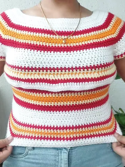 A close-up of the Woolie Top, showing the clean lines and even stitches. The made-to-measure fit ensures it flatters your shape perfectly.