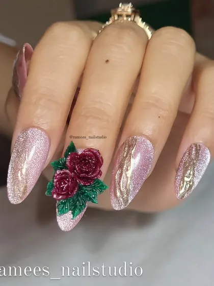 A different angle of the 3D rose bouquet on the shimmering pink cat-eye base. This design combines sparkle with intricate sculptural work for a truly premium feel.