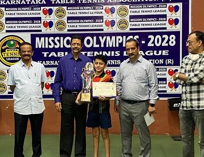 Atharv on the podium at the Mission Olympics league.