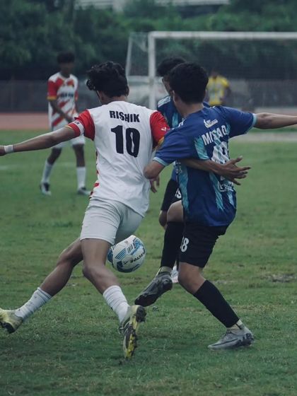 Leaving defenders in his wake. Our captain, Rishik Thakur, skillfully dribbles past an opponent.