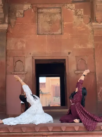 A partner version of a gentle backbend, supporting each other in the stretch.