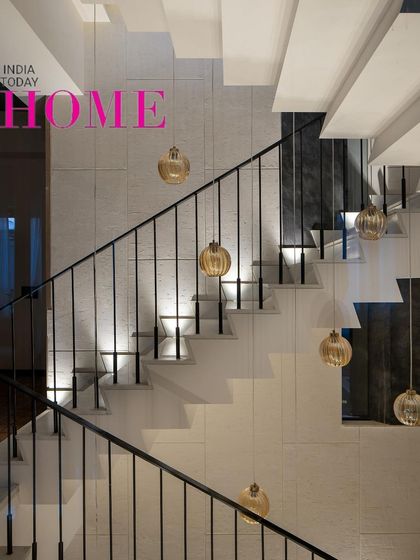 This elegant staircase, featured in India Today Home, reflects our belief that every corner should feel thoughtful. The interplay of light on textured walls and marble steps creates a serene atmosphere.