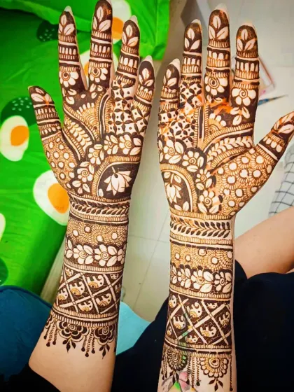 Another angle of the lotus-themed design, showing the full coverage up the arm.