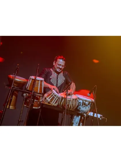 Our percussionist, laying down the tabla rhythm for the corporate audience.