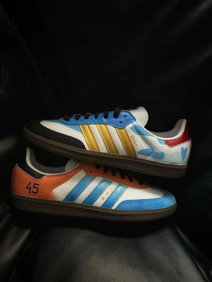 The custom Adidas Sambas for Rohit Sharma, featuring Mumbai Indians colors and his jersey number 45.