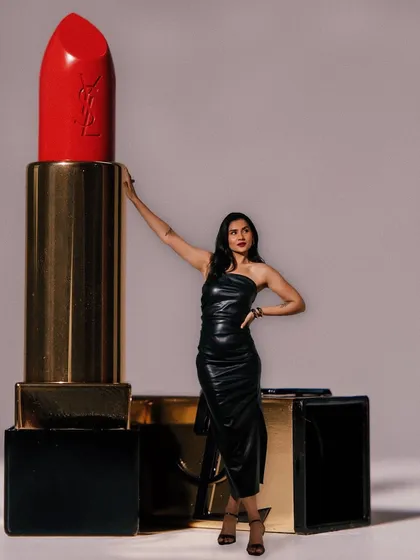A creative, larger-than-life edit with a giant YSL lipstick, making for a memorable and shareable brand moment.