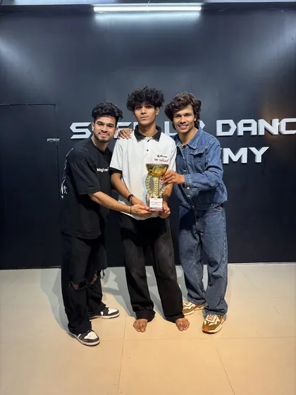 Another champion from our academy's competition. We believe in rewarding dedication and talent.