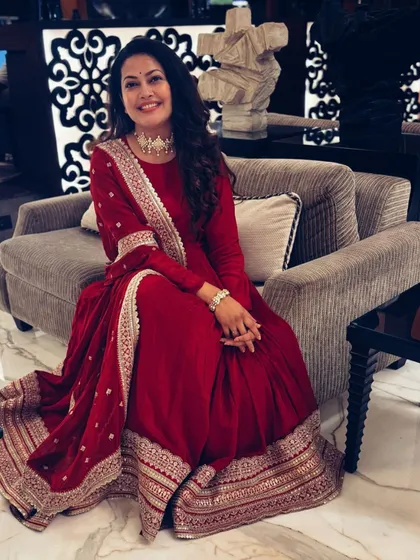 For a Diwali Pahat event, I styled Priyanka Barve in this magnificent floor-length red Anarkali. The rich color and detailed embroidery make it a perfect festive statement piece.