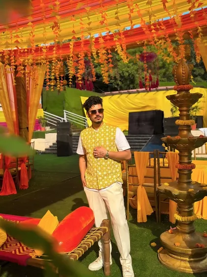 A full-length shot showing the beautiful Haldi decor. I always ensure my setup blends seamlessly with the event's aesthetic while delivering powerful sound.