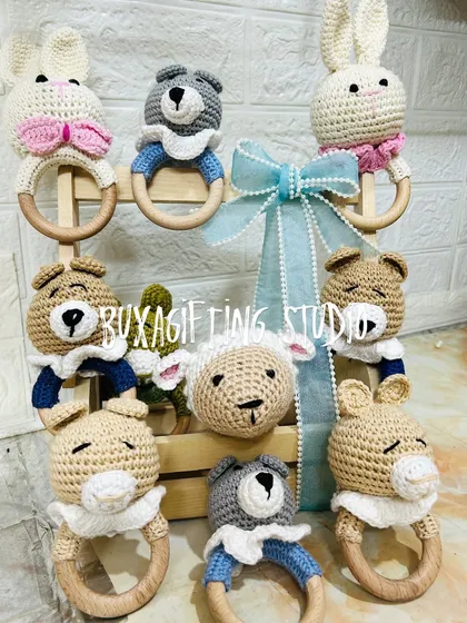 A full display of my handmade crochet rattles, featuring bunnies, bears, and sheep. They make a wonderful, gentle first toy for a baby.