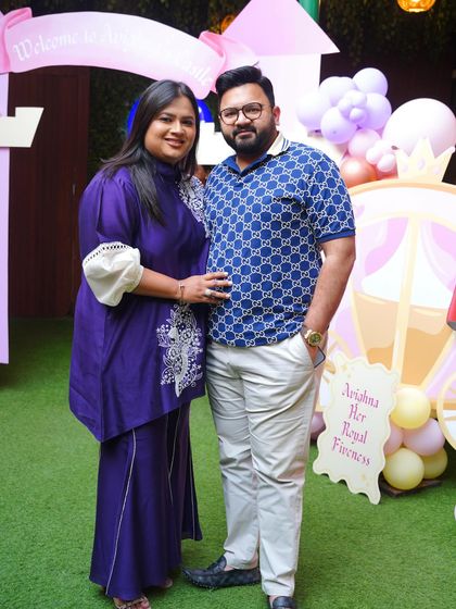 Happy parents enjoying the magical atmosphere of their child's princess party. We handle all the details so you can relax and be a guest at your own event.