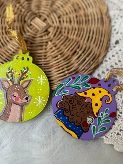 A reindeer and a gnome, adding a touch of whimsy to your Christmas tree.