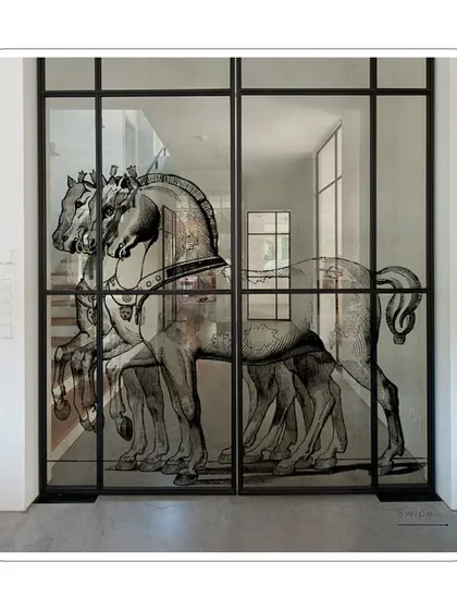 Another example of how my designs can be printed on different surfaces. This illustration of horses is applied to a glass door, creating a statement piece that is both functional and beautiful.