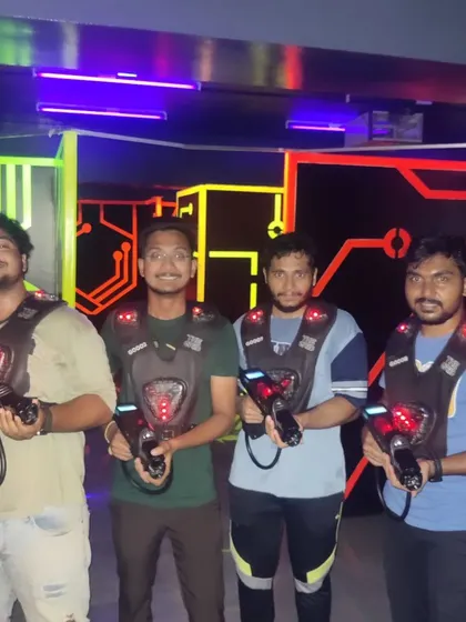 Another squad ready for a laser tag battle royale. The glowing vests and futuristic phasers make for an immersive experience.