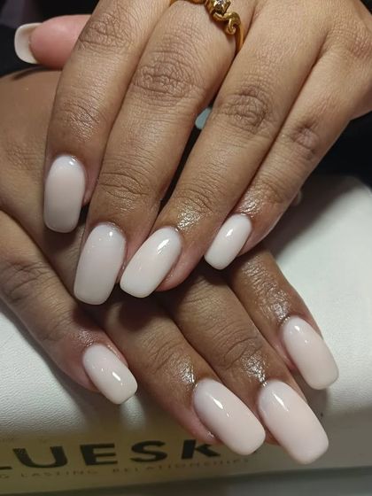 Oh, them nude nails. The perfection is unmissable in this set of milky nude extensions with a clean, square shape.