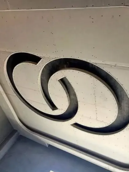This interlocking rings design is crafted from gypsum board before the final finishing. This stage is crucial for getting the shapes and curves just right.