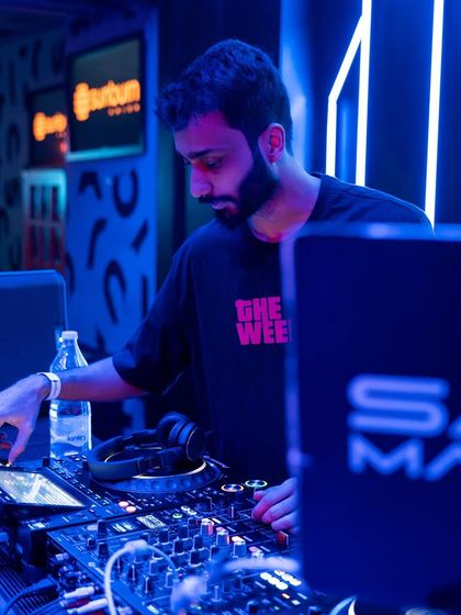 A detailed shot of my hands on the Pioneer mixer at Sunburn.