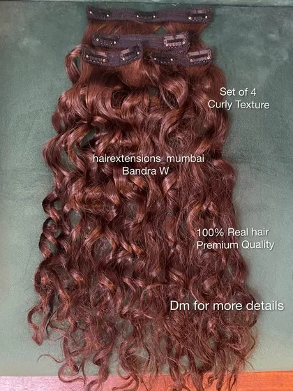 We provide a variety of textures, including these premium quality curly hair extensions. This set of four clip-ins is made from 100% real hair, allowing you to match your natural curl pattern or create a completely new wavy look.