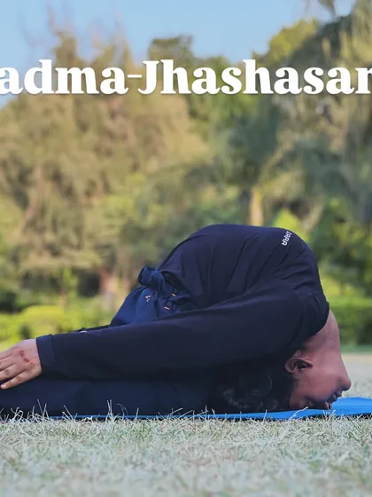 The Padma Jhashasana, or Fish Pose in Lotus, is a deep backbend that opens the chest and throat.