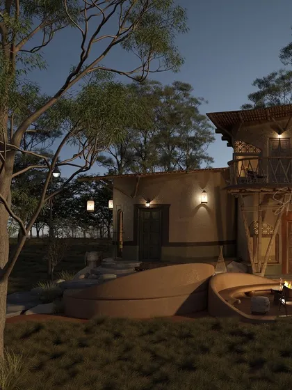 The outdoor lounge area, with its sunken seating and central fire pit, is especially inviting at dusk. The lighting is designed to be subtle, enhancing the natural beauty of the evening and encouraging guests to unwind.