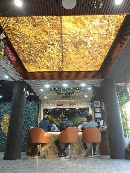 Another angle of the magnificent backlit ceiling, showing how it transforms the entire ambiance of the space.