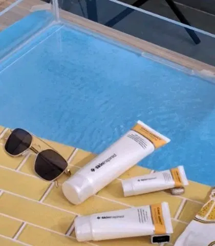Our in-studio pool setup, showing the water tank and tiled surface we used to create a summer vibe for a sunscreen shoot.